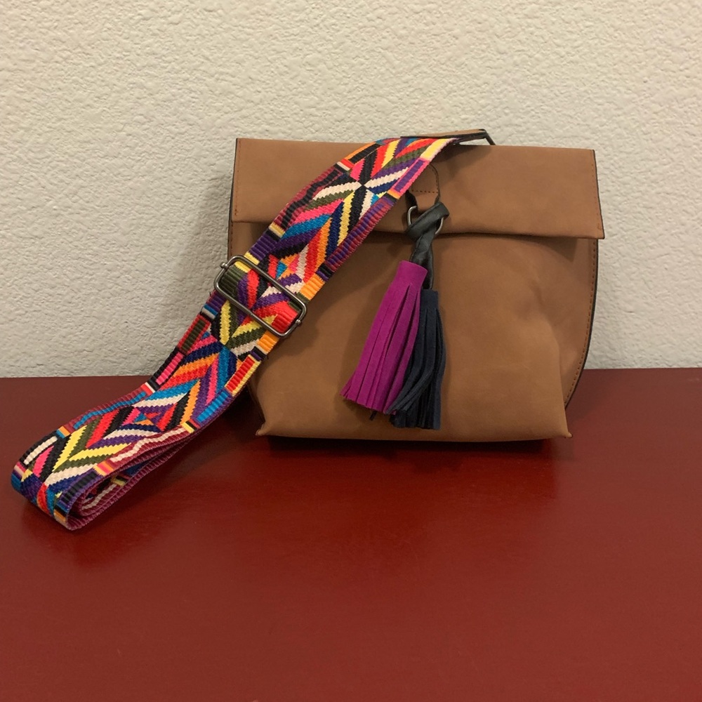 Cute, small camel color purse with colorful strap and tassels. Never used.